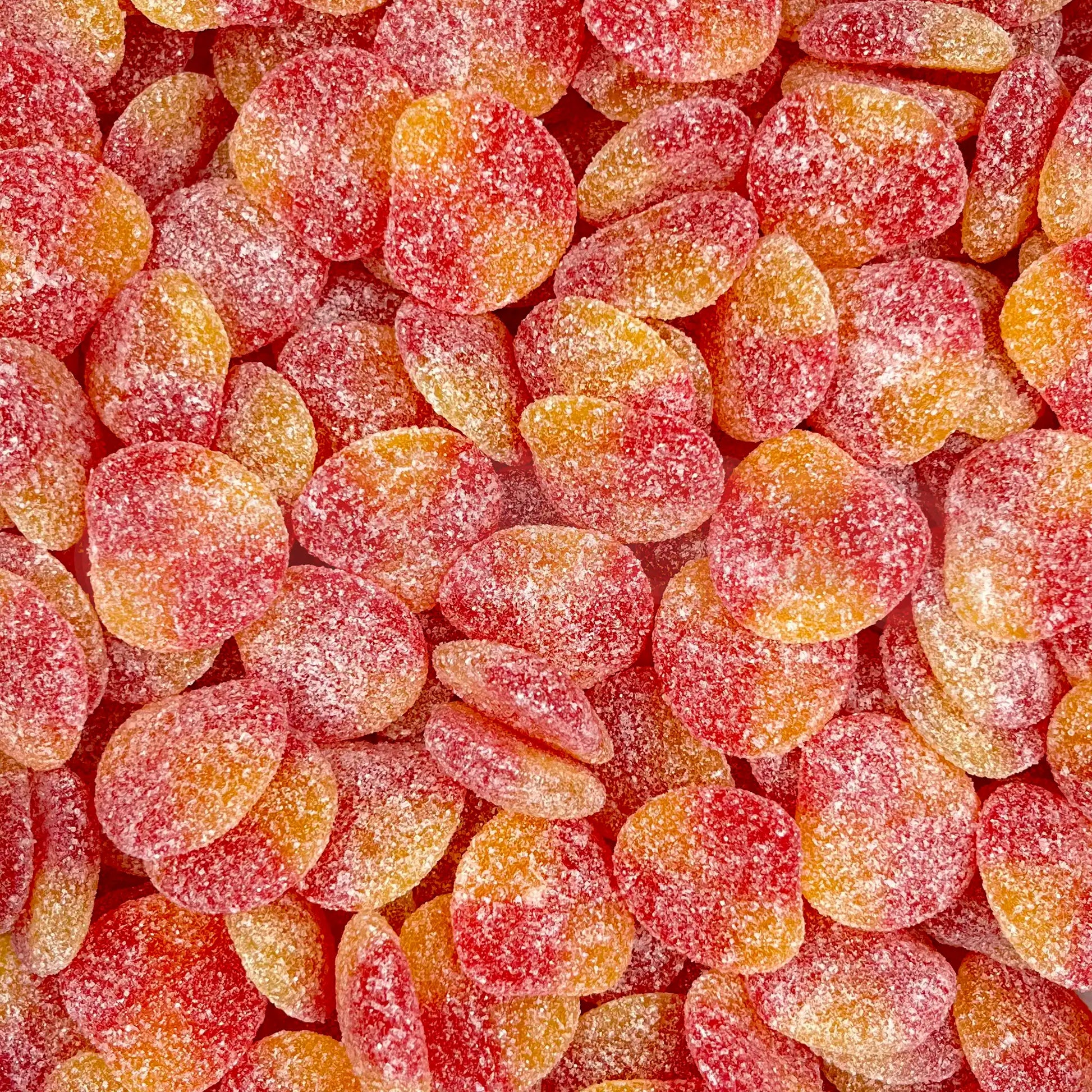 Bonbons Haribo Happy Peaches en forme de demi-pêches en vrac