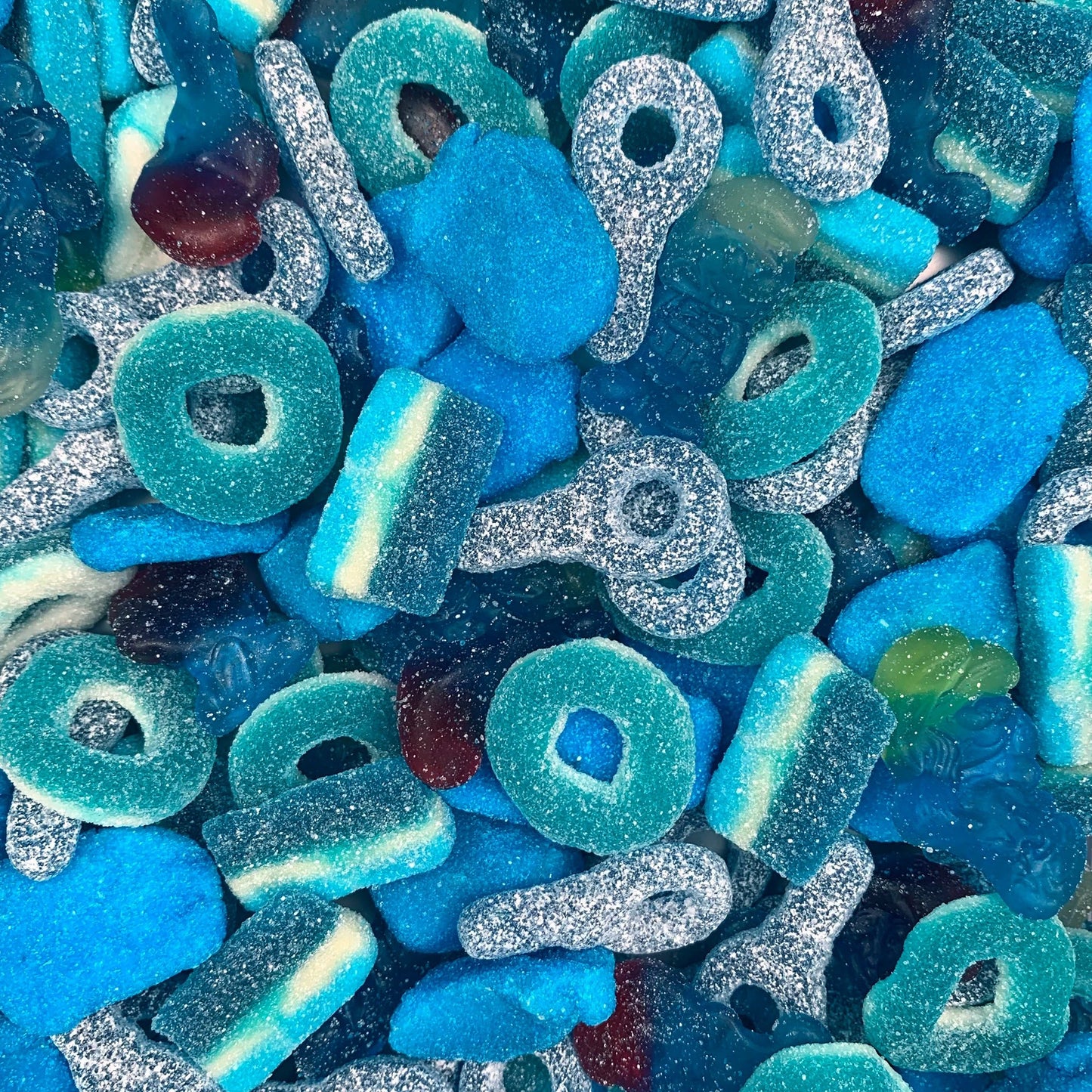 Assortiment bonbons bleus acides.