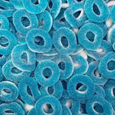 Bonbons gélifiés en forme d'anneaux bleus et blancs aux saveurs framboise bleue et acidulée.