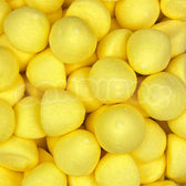 Bonbons jaunes en forme de balle de golf à la banane