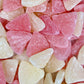 Bonbons fruités Haribo goût pamplemousse avec sucre et acidité