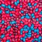 Bonbons jelly beans fruits des bois en vrac bleu, rose et violet