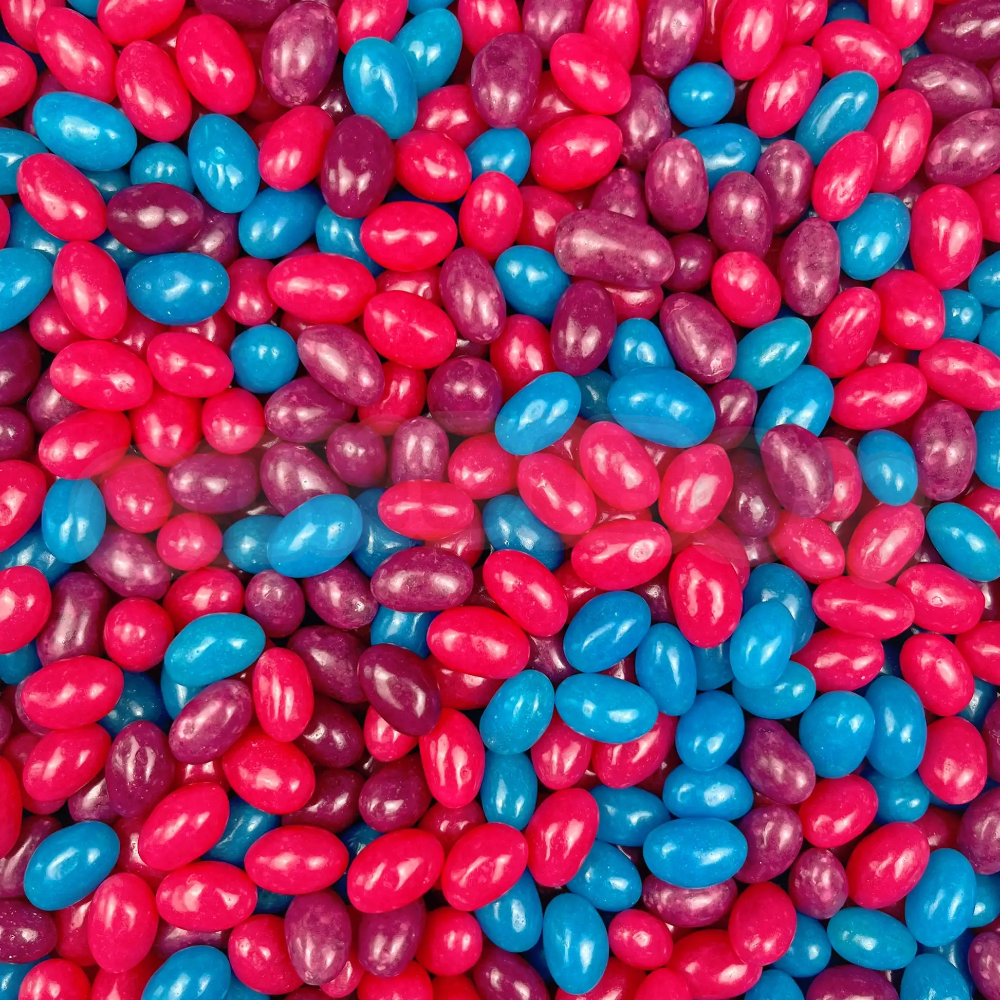 Bonbons jelly beans fruits des bois en vrac bleu, rose et violet